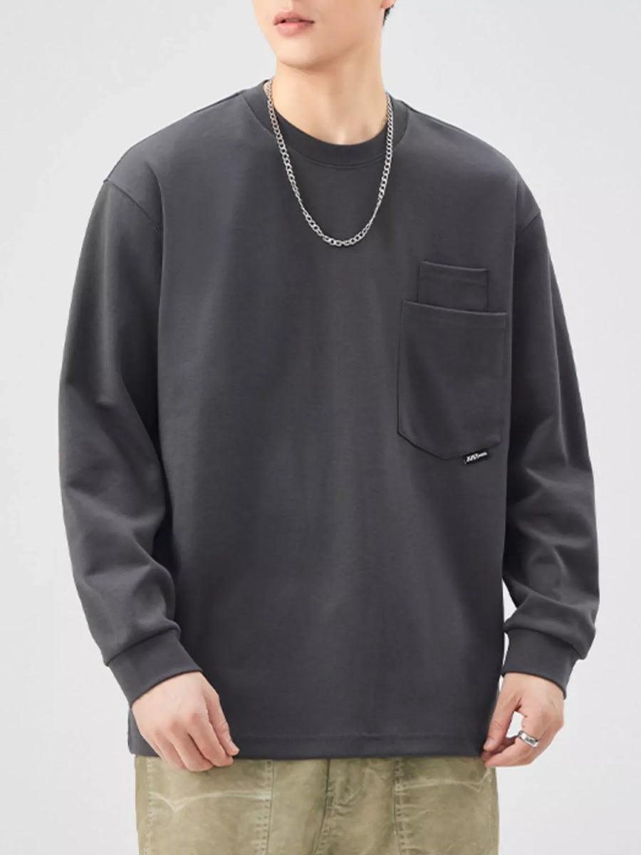 Dark gray casual oversized long-sleeve sweatshirt with a chest pocket and crew neck.