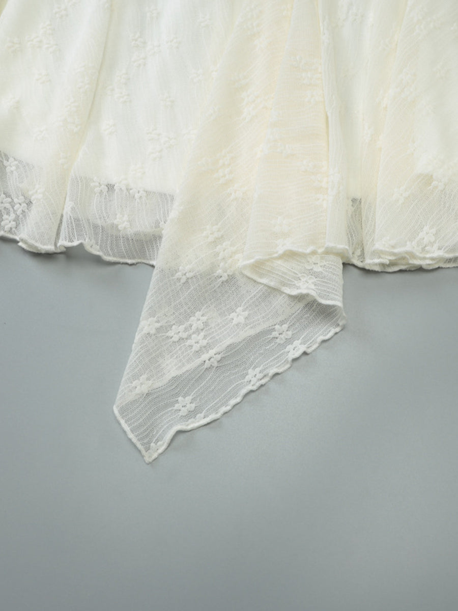 Cream lace mini dress with asymmetrical hem and floral pattern detail