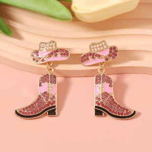 Synthetic Pearl,Resin,Zinc alloy,Rhinestone Care instructions: Avoid wearing dur earrings in gold with dangle silhouette