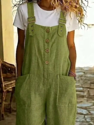 Army green wide leg romper with buttons and pockets, worn over a white t-shirt.