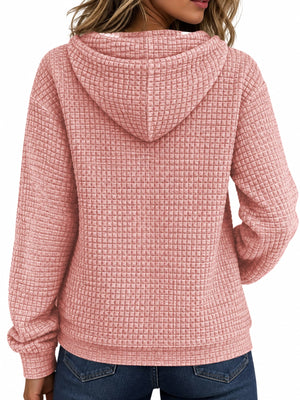 blush pink zip hoodie with front pockets and long sleeve