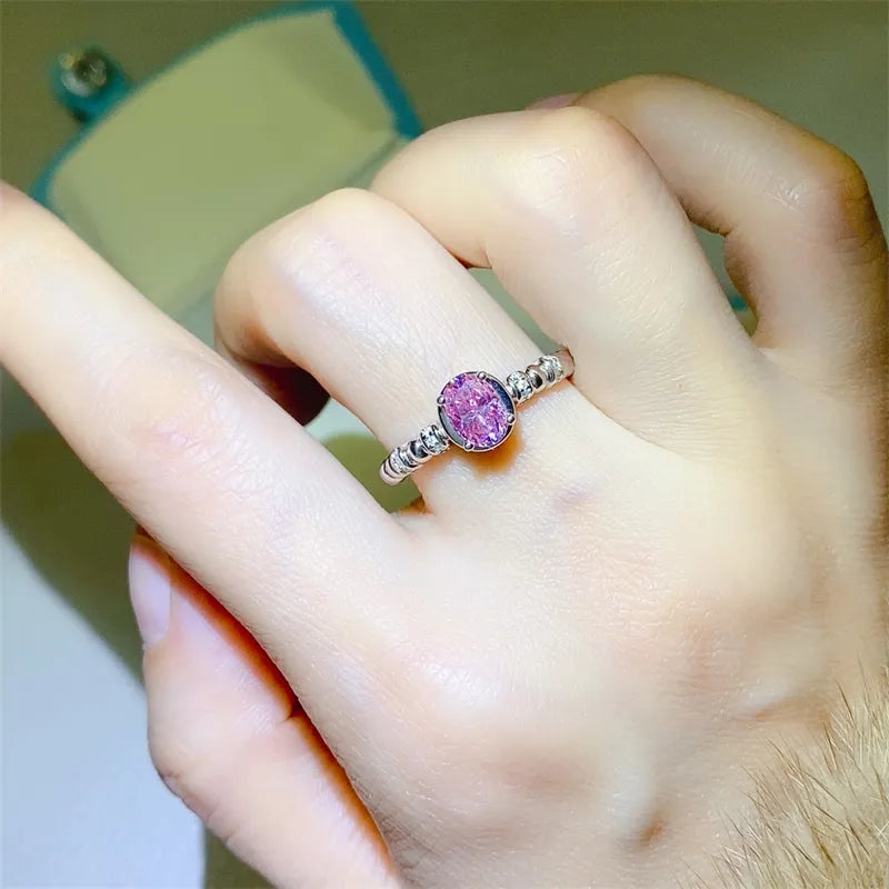 Pink oval moissanite beaded ring in sterling silver