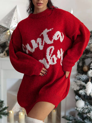 Red oversized sweater dress with white "Santa Baby" graphic, crew neck, long sleeves.
