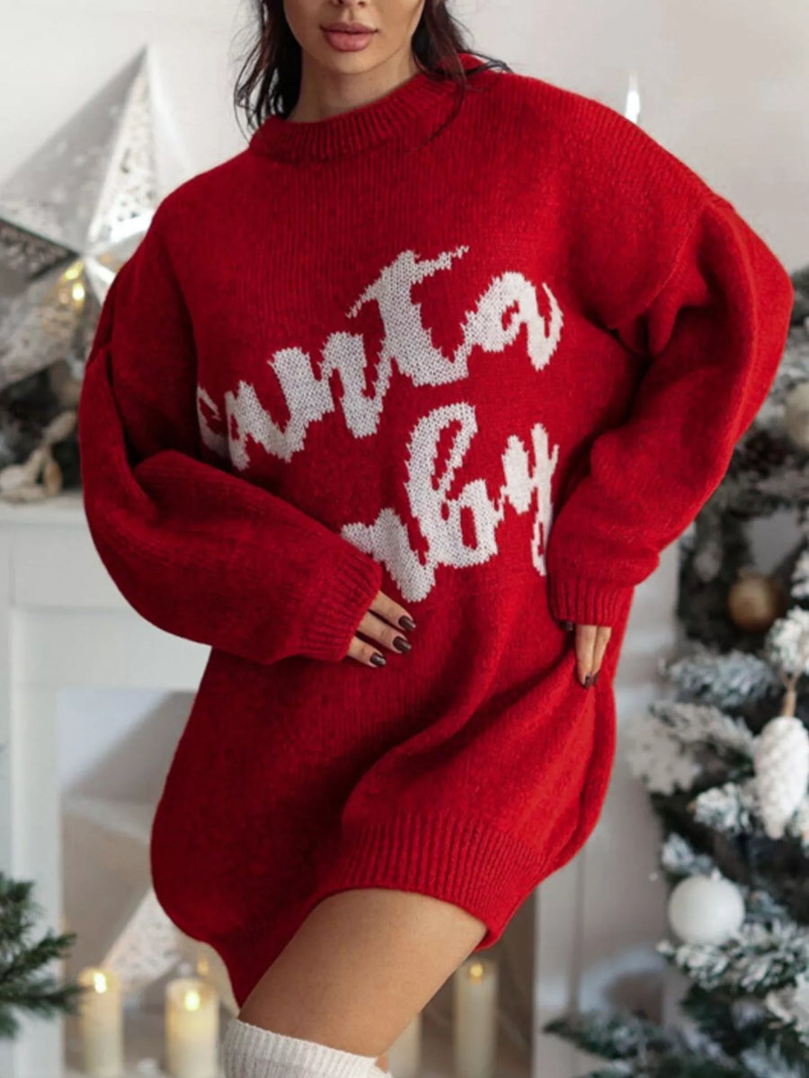 Red oversized sweater dress with white "Santa Baby" graphic, crew neck, long sleeves.