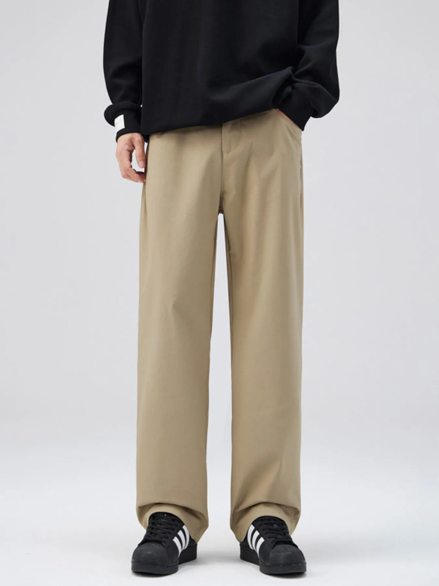 Khaki casual loose fit pants with a wide leg, styled with a black sweatshirt.