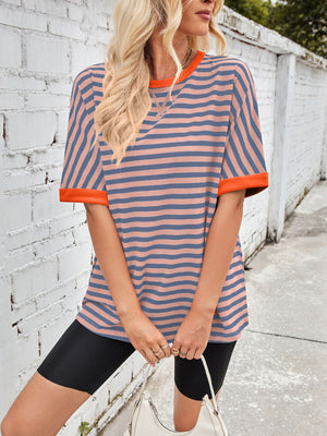 Striped Breton tee with orange trim and neckline detail.