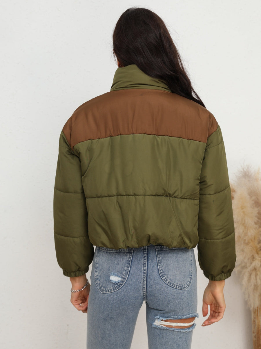 Colorblock cropped puffer jacket in army green with brown accents, featuring a stand-up collar and quilted design.