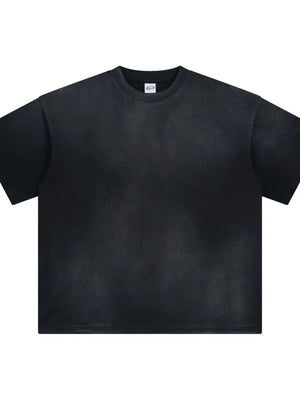 Oversized washed black t-shirt with relaxed fit and crew neck.