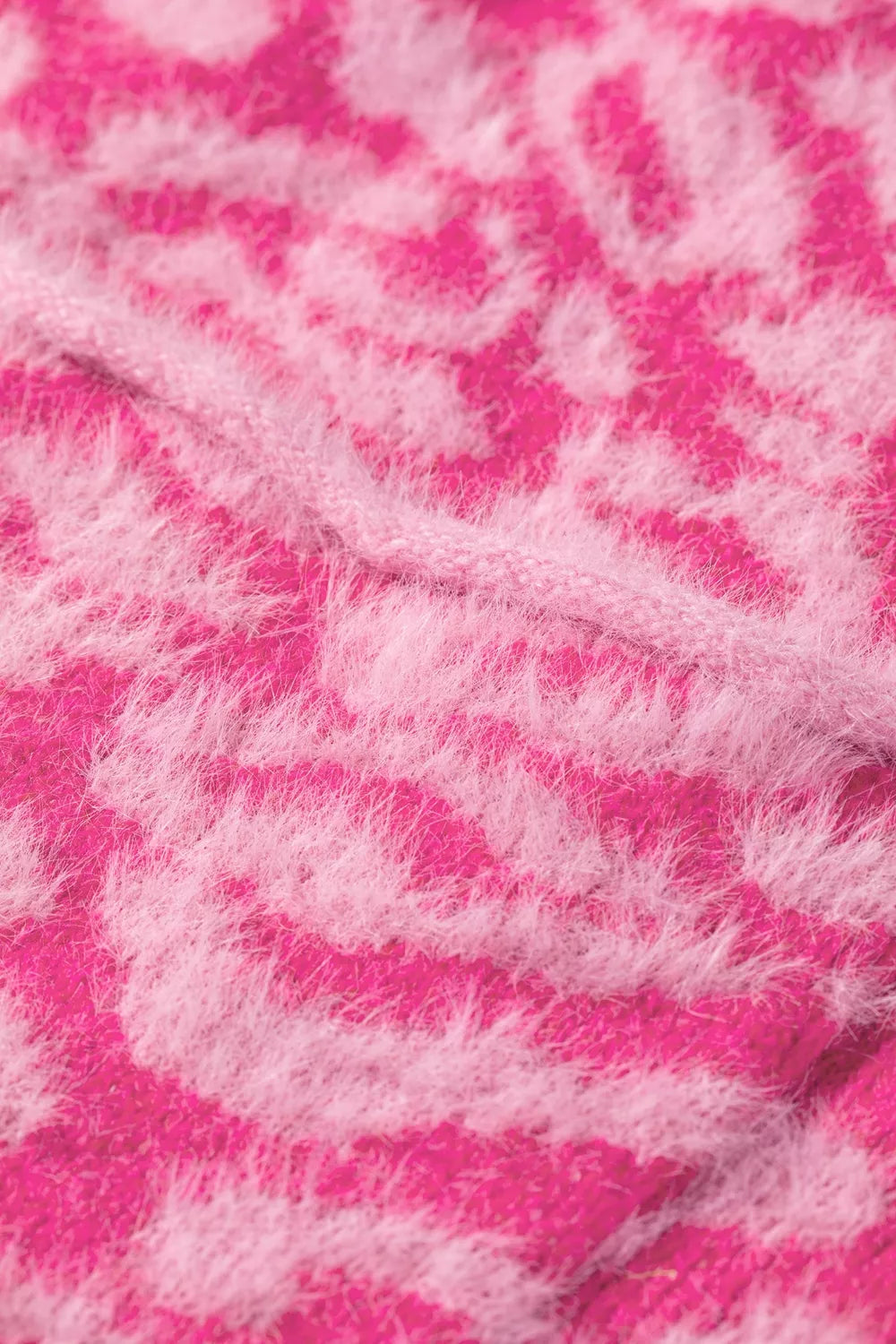 sweater vest in light pink with buttoned and hip-length