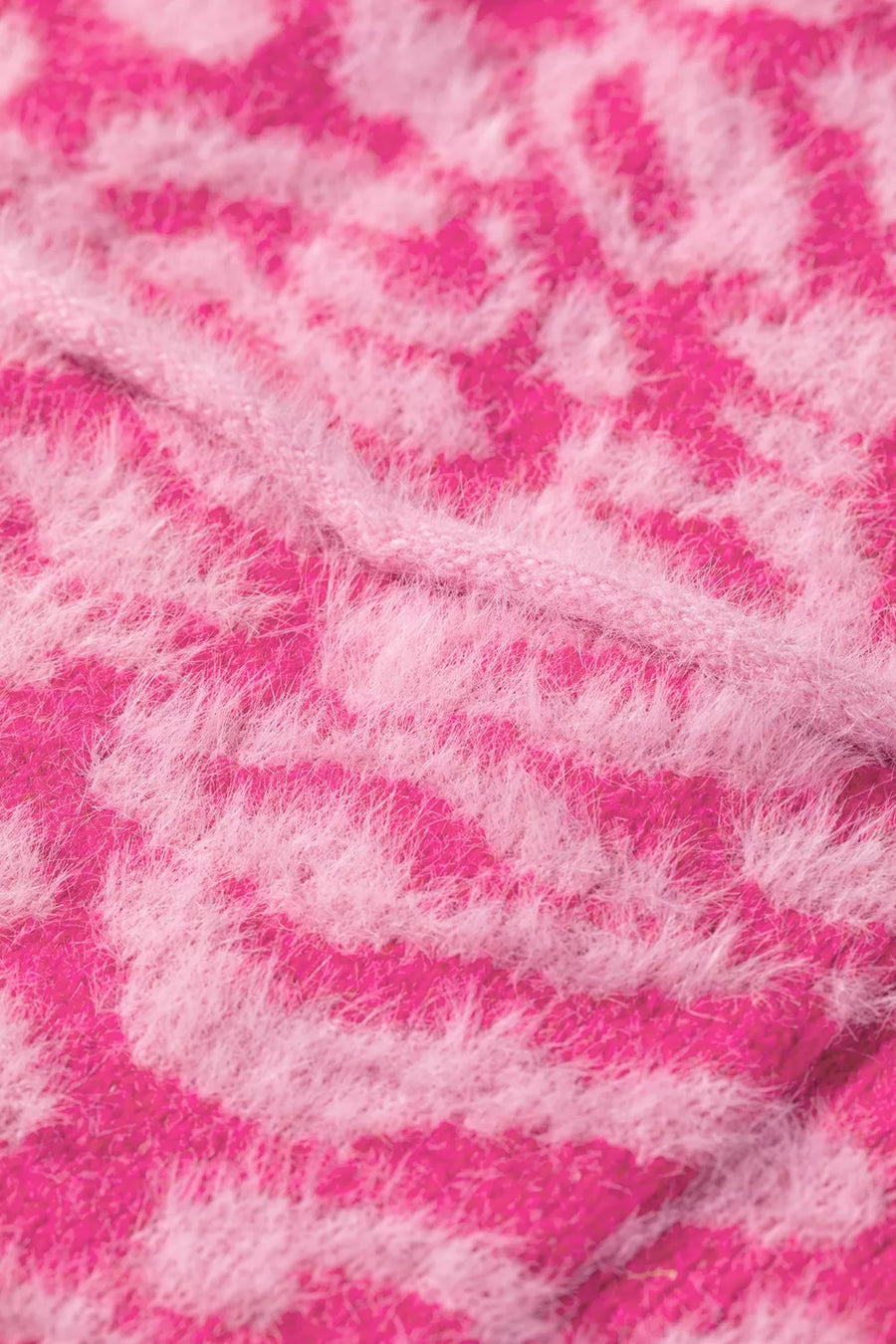 sweater vest in light pink with buttoned and hip-length
