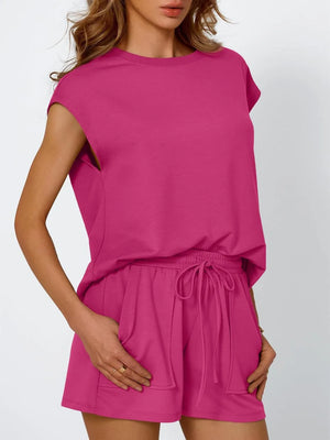 Hot Pink relaxed fit drawstring short set with cap sleeves and pockets.