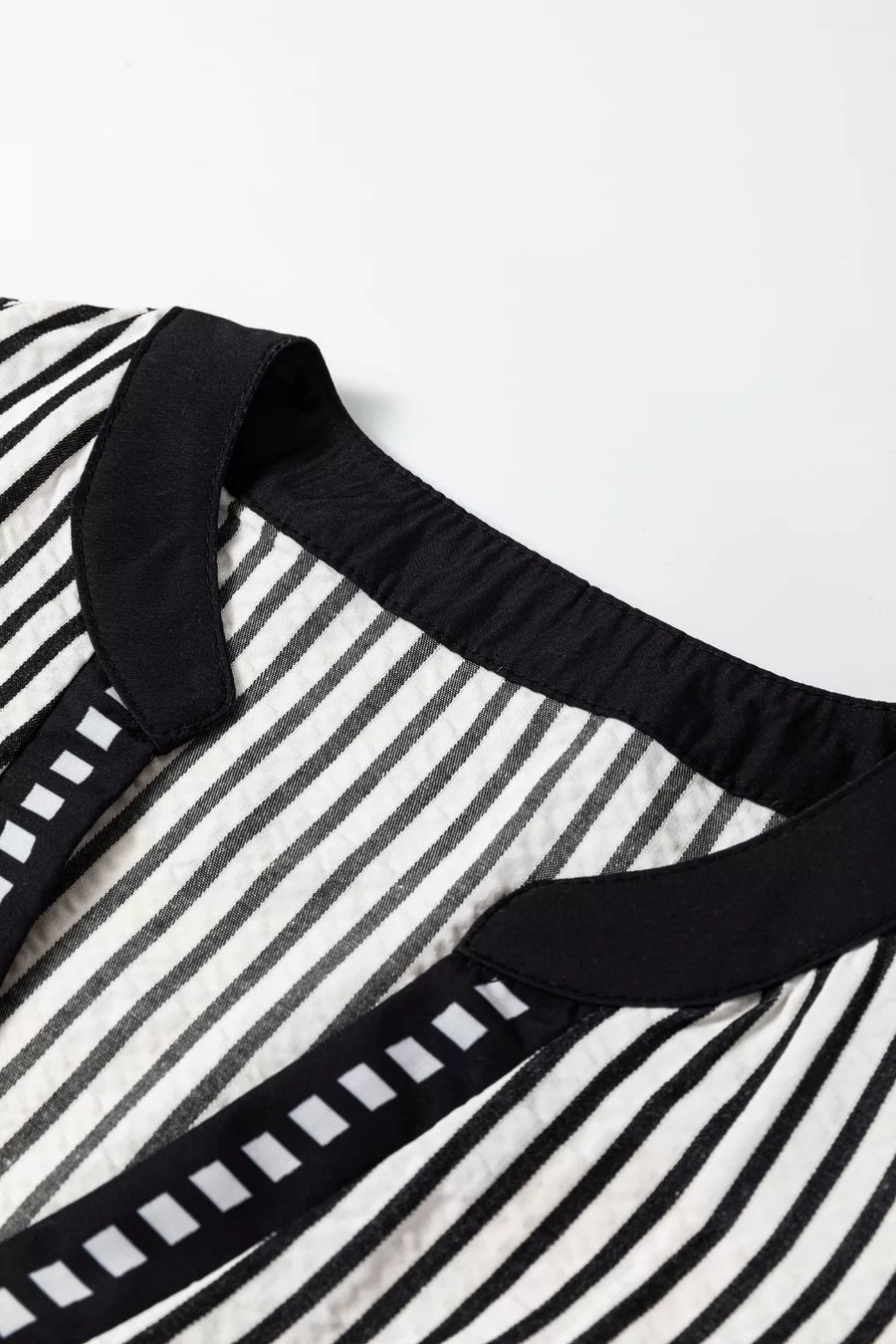 Chic black and white striped cotton midi dress with black trim and square detail.