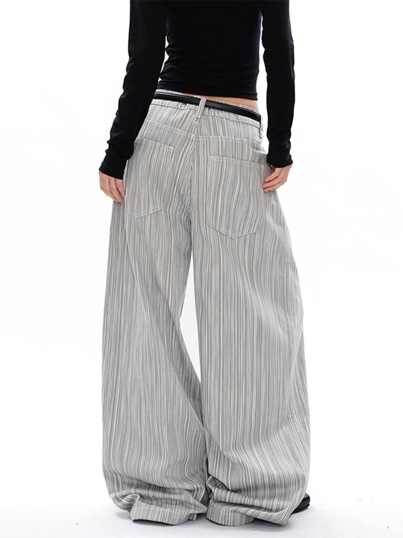 Men's grey pinstripe wide-leg sweatpants with a relaxed fit and elastic waistband.