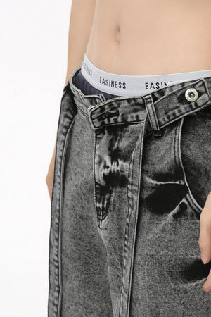 Acid wash belted palazzo jeans in dark, with a tie waist detail.