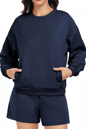 Dark blue sweatshirt with crew neck, long sleeves, and front pocket, paired with matching shorts.