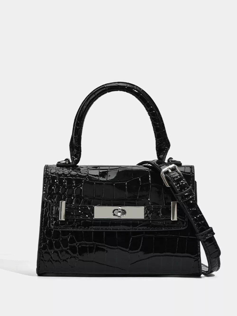 Black croc-embossed small tote bag with silver hardware and adjustable strap.