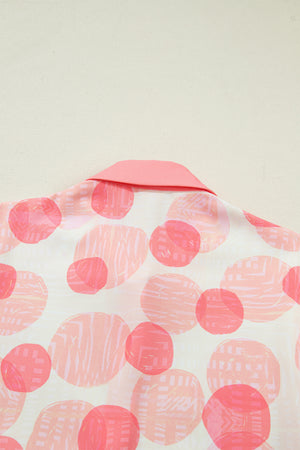 Polka dot babydoll blouse with pink collar and ruffle trim detail