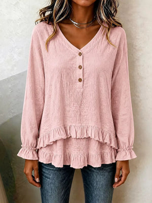 blouse in blush pink featuring buttoned and relaxed fit