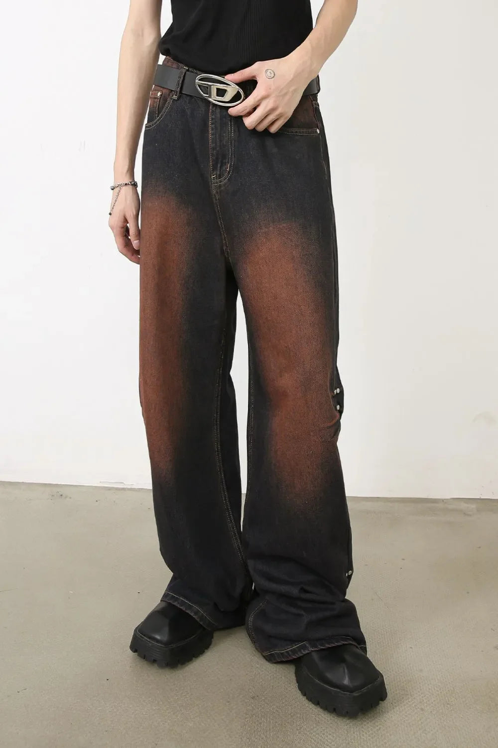 Faded wash palazzo jeans in dark denim with stud details and a wide leg