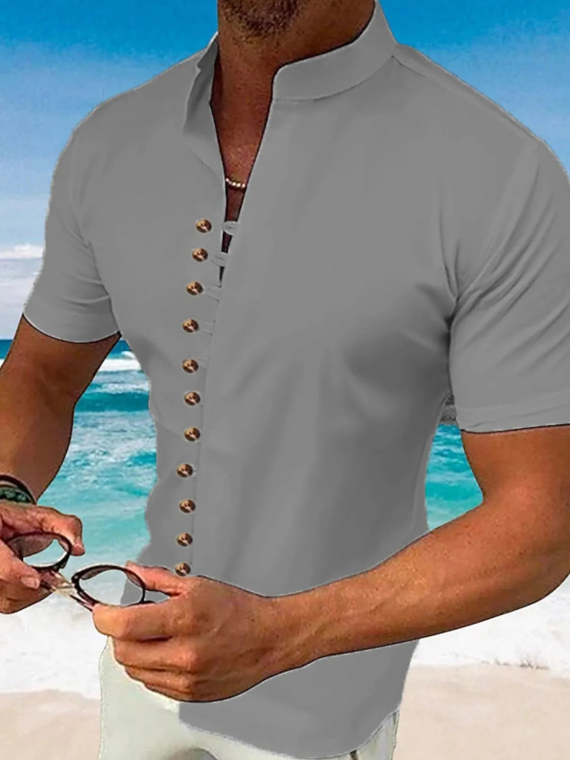 Mandarin collar Henley shirt in dark gray with button detail, short sleeves.