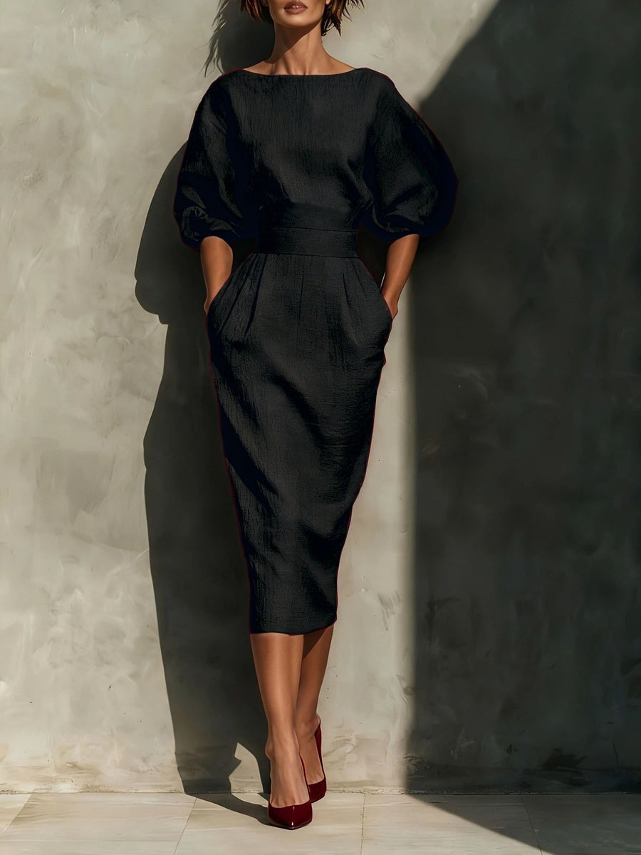 Black puff sleeve midi dress with pockets and boat neck.