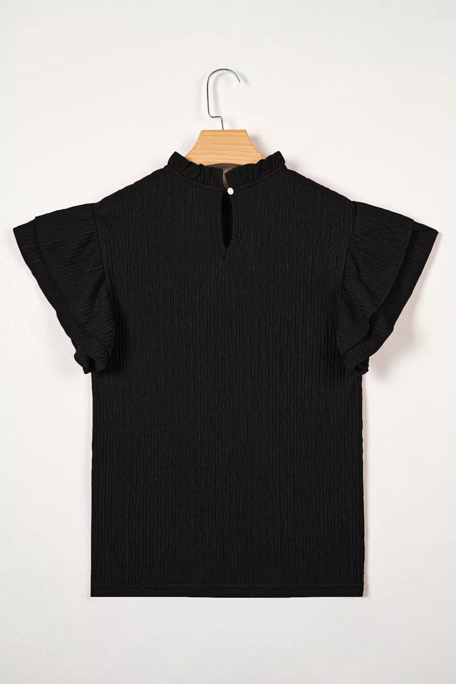 Black textured maternity shirt with ruffled mock neck and flutter sleeves