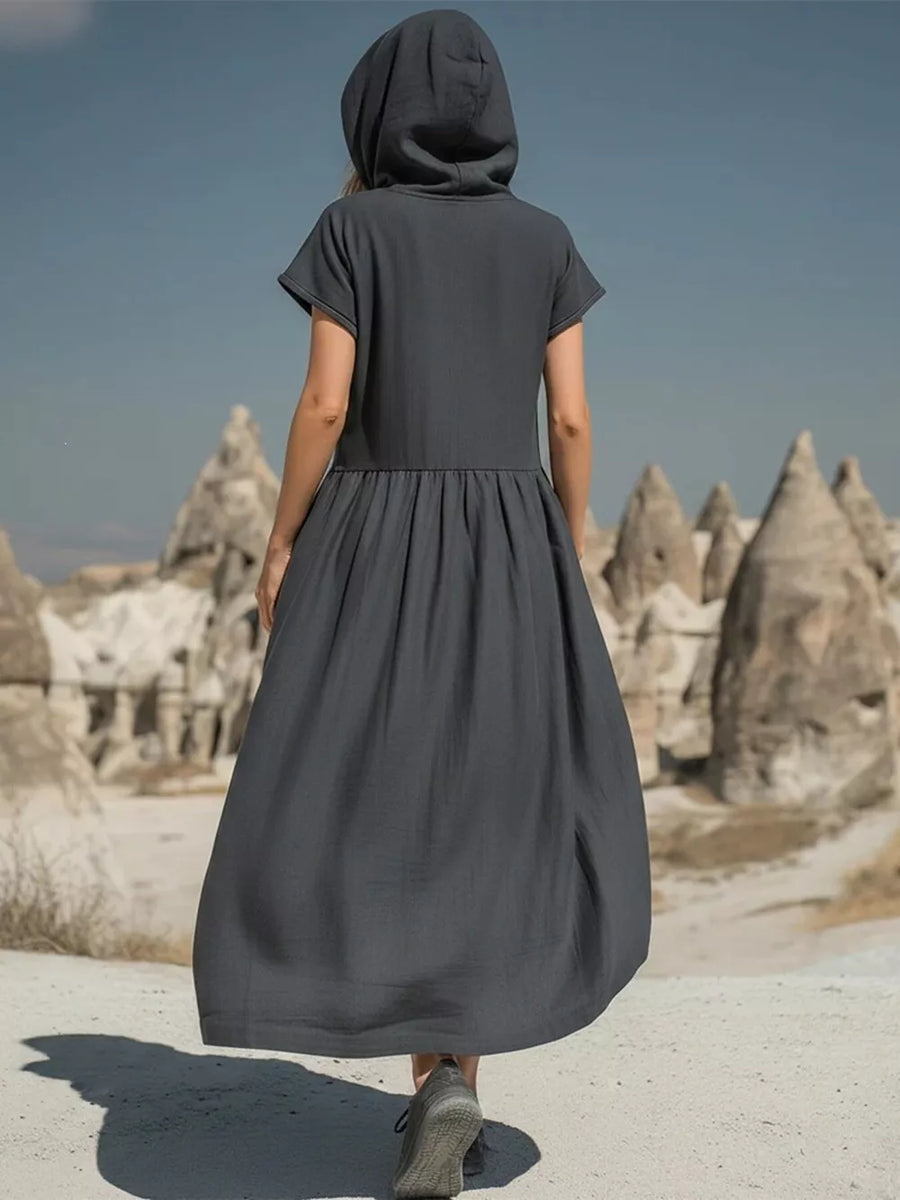 Grey hooded midi dress with short sleeves and gathered waist, shown from the back.