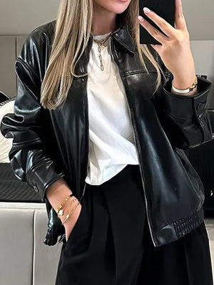bomber jacket in black featuring zipper and relaxed fit