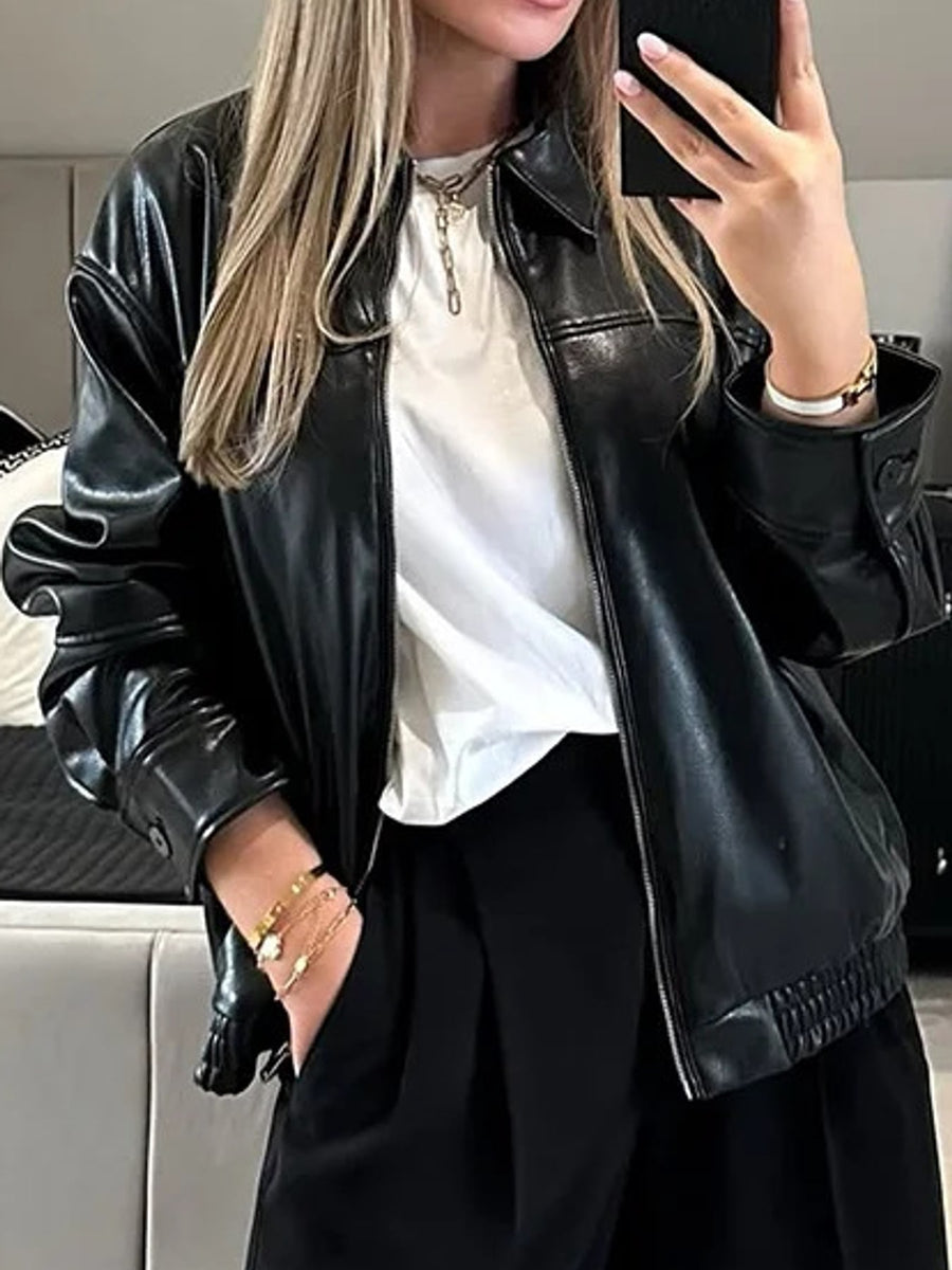 bomber jacket in black featuring zipper and relaxed fit