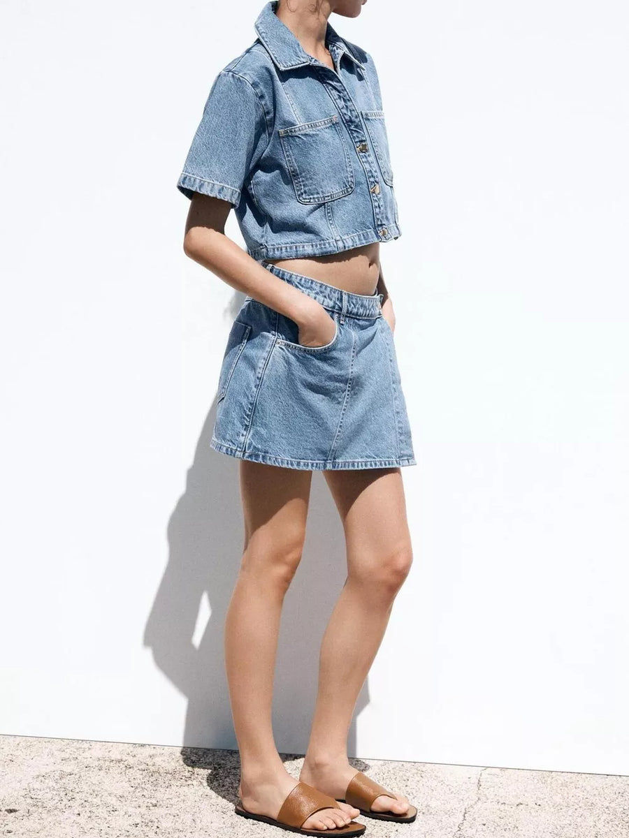Denim cropped button-up top and skort set in sky blue with contrast stitching.