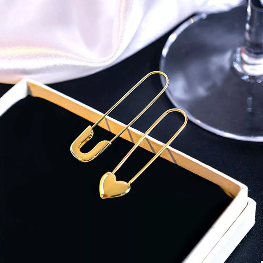 earrings in Gold with heart charm and drop