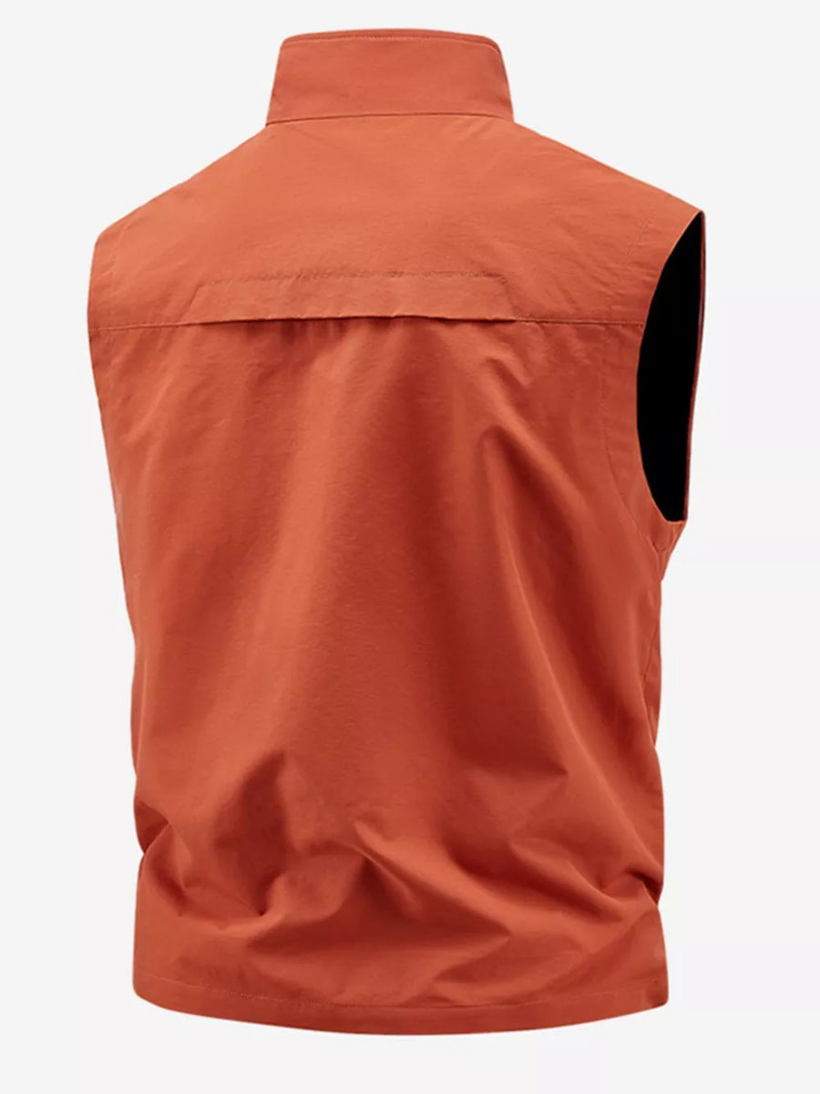 Orange men's outdoor vest with stand-up collar and back yoke detail.