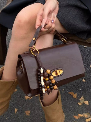 Brown pu leather flap shoulder bag with beaded tassel detail