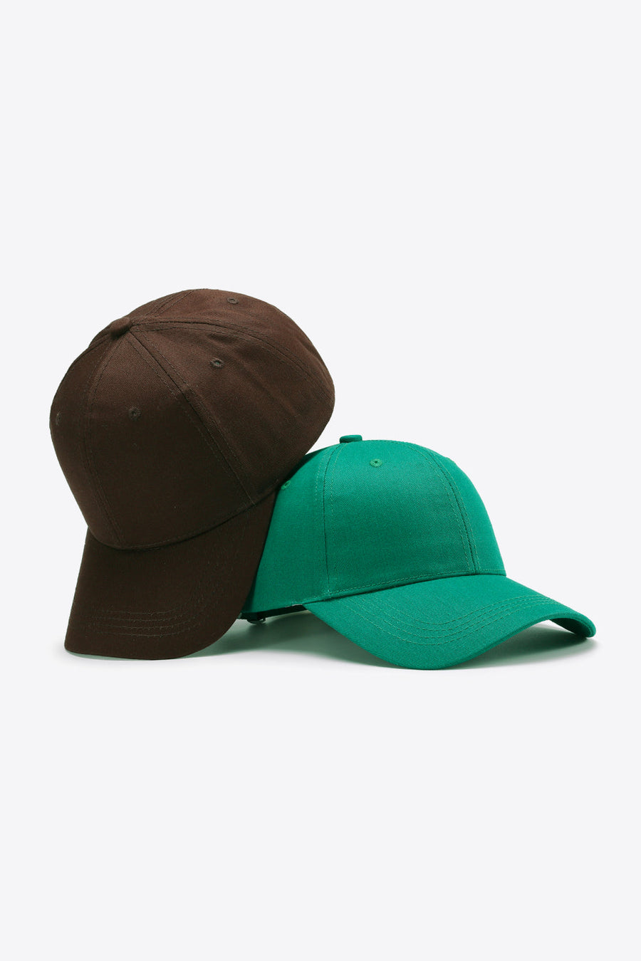Brown and dark green cotton twill baseball caps