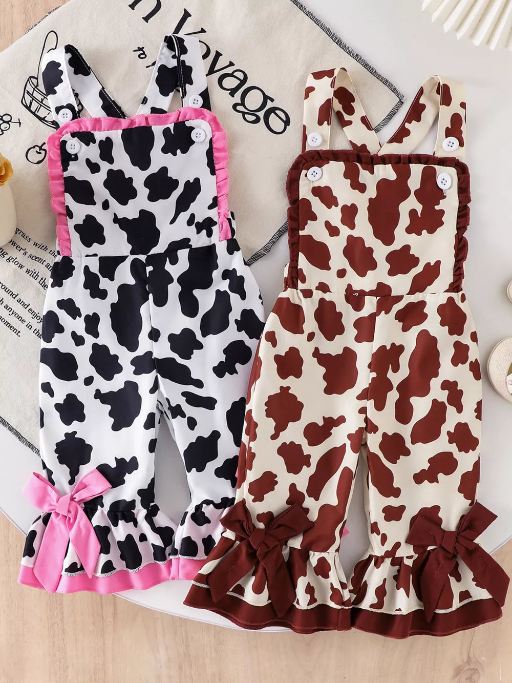 Children's Cow Print Ruffle Jumpsuit in Brown And White