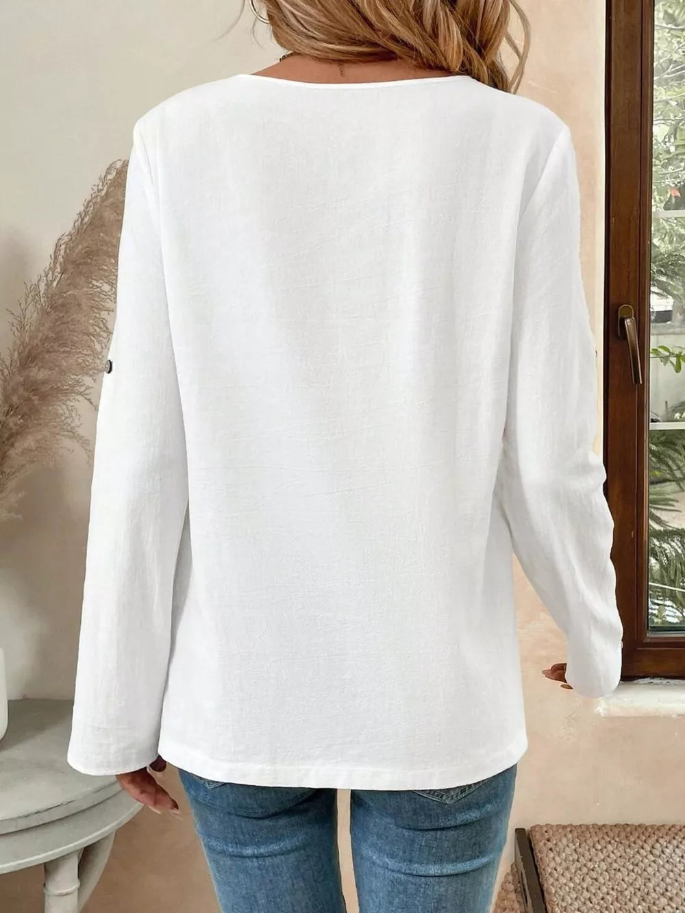 100% polyester Care instructions: Machine wash cold blouse in White with relaxed silhouette