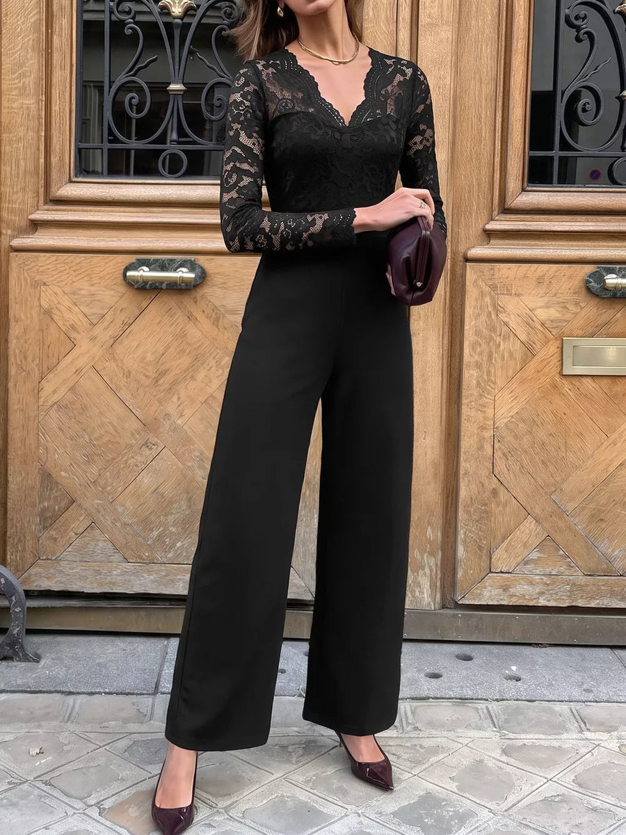 95% polyester, 5% elastane Care instructions: Machine wash cold jumpsuit in black with flared silhouette