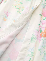 Apricot floral midi maternity dress with ruffle sleeves and button detail
