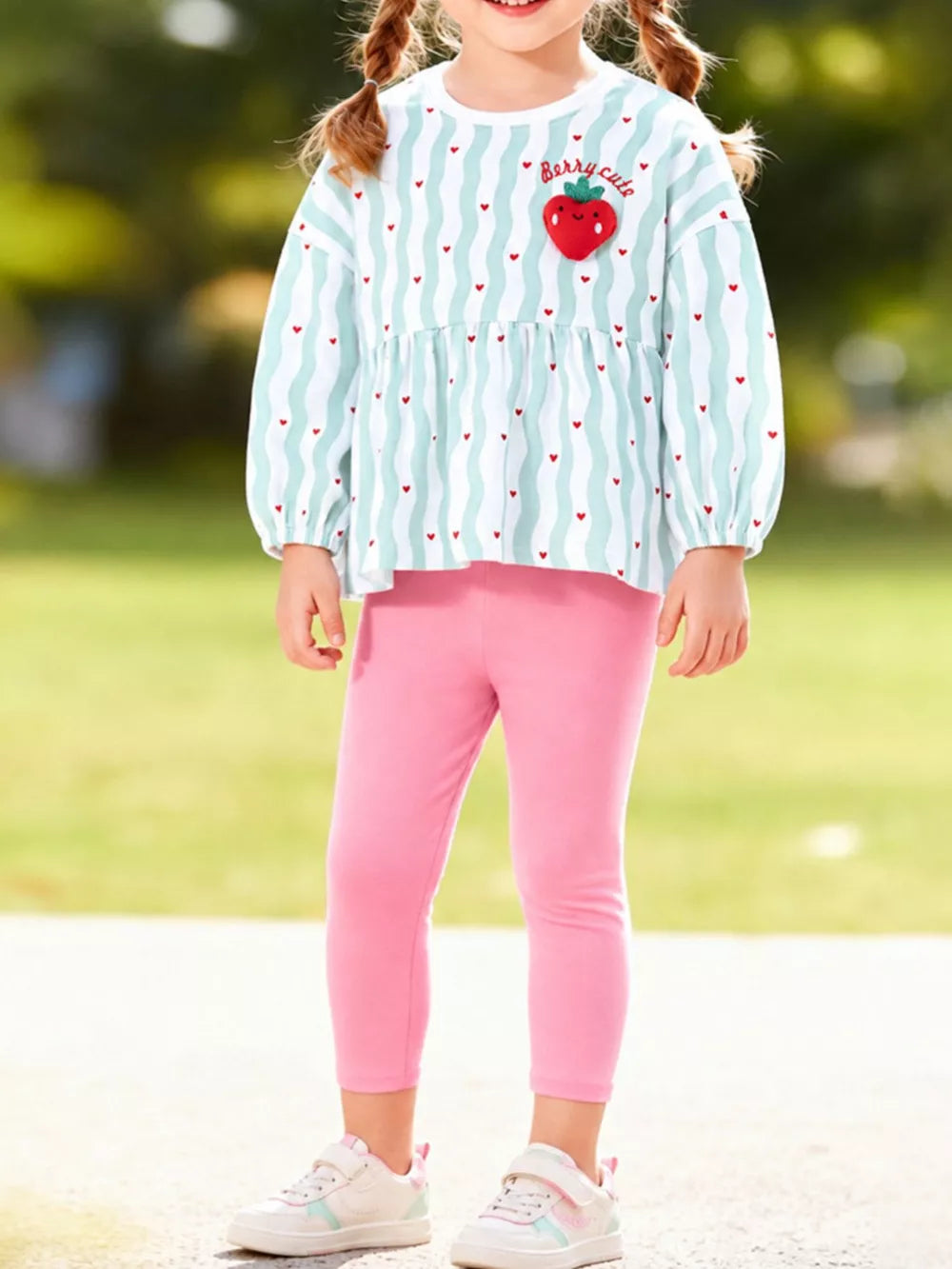 white clothing set with striped and round neck