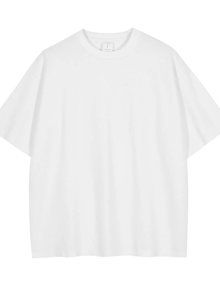 White oversized crewneck t-shirt with relaxed fit and short sleeves.