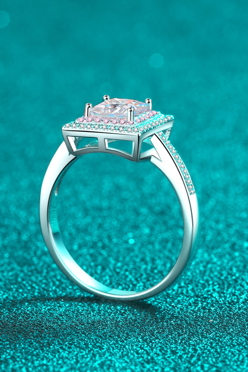 Princess cut halo ring with pink accents in silver