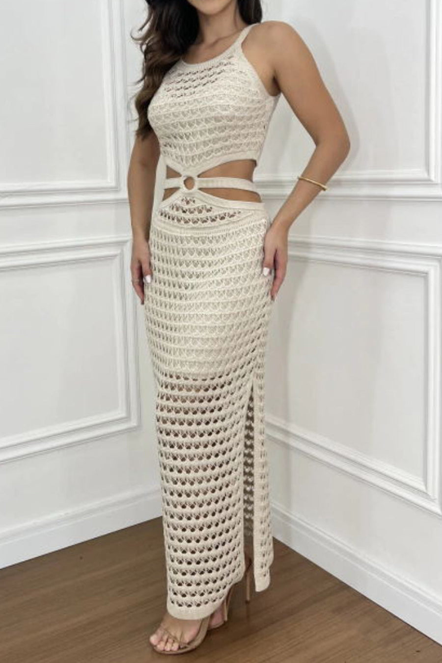 Beige crochet cutout maxi set with a halter neckline and high slit.