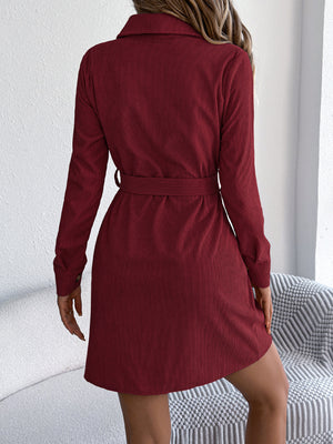 beige shirt dress featuring buttoned and ribbed