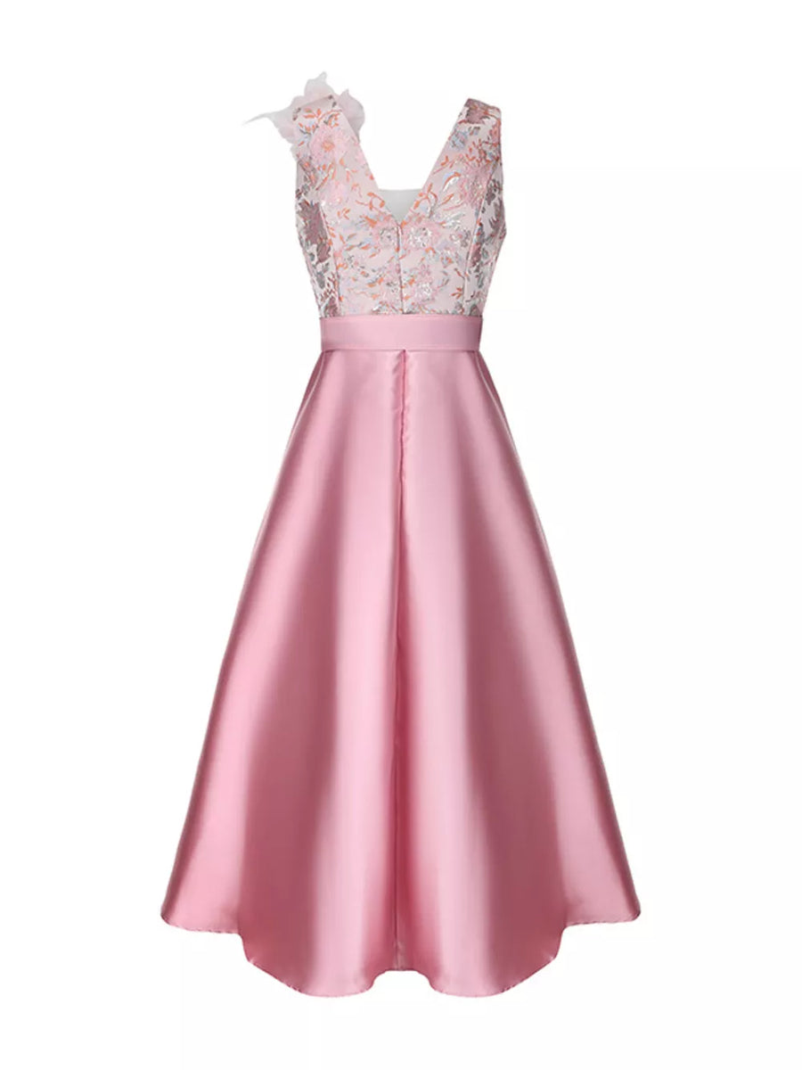 Pink midi dress with floral appliqué bodice, V-neck, belted waist, and A-line skirt.
