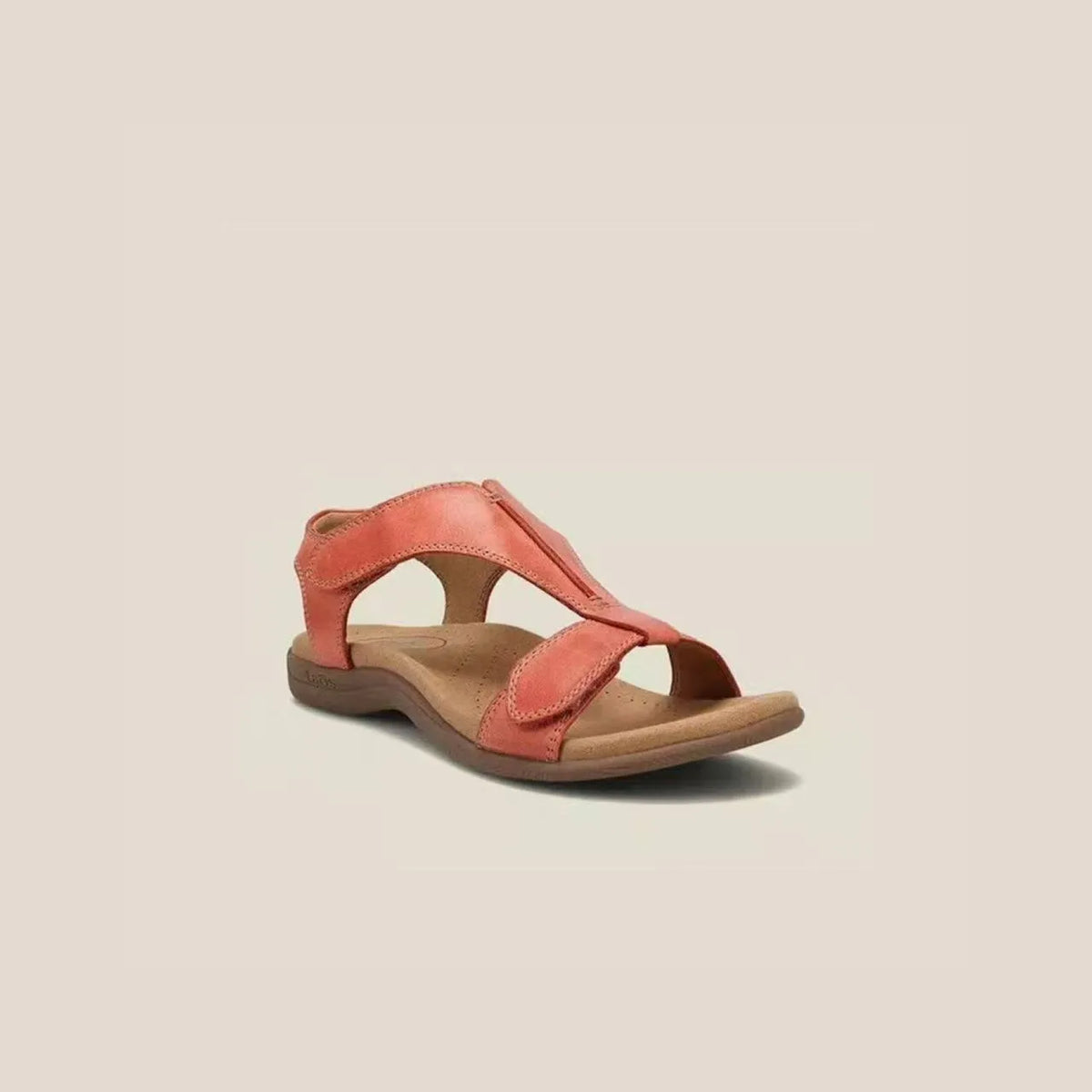 Tangerine leather T-strap comfort sandals with adjustable straps and cushioned footbed.