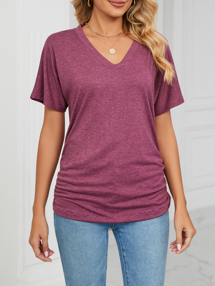 Burgundy relaxed V-neck t-shirt with short sleeves and ruched sides.