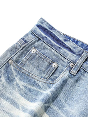 Light blue relaxed fit denim capris with pocket detail and distressed wash.