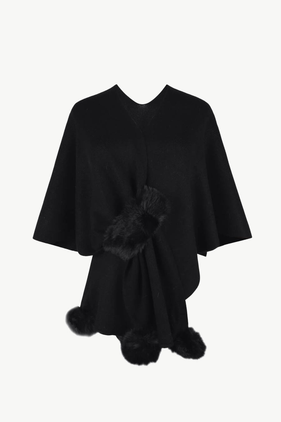 Black knit cape with fur trim detail at the front and hem.