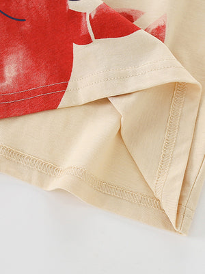 Beige cotton toddler t-shirt with red lobster graphic and visible stitching details.