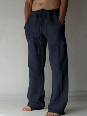 Navy linen blend wide-leg drawstring trousers with pockets.